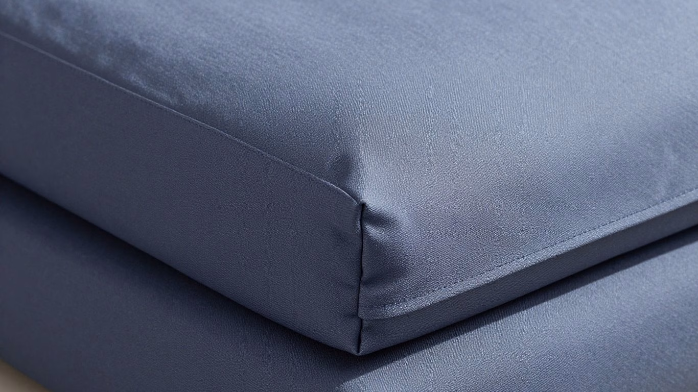Custom patio cushion cover in a solid color.